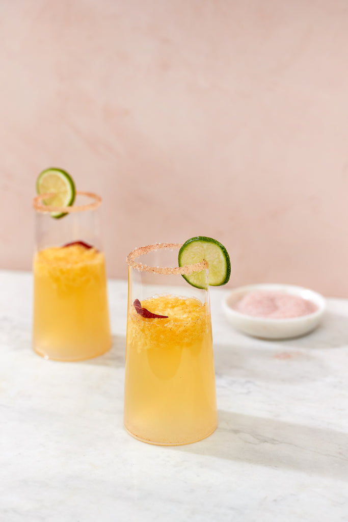 Mixers and Garnishes to Add To Your Zero-Proof Bar for Pride Month and Every Month